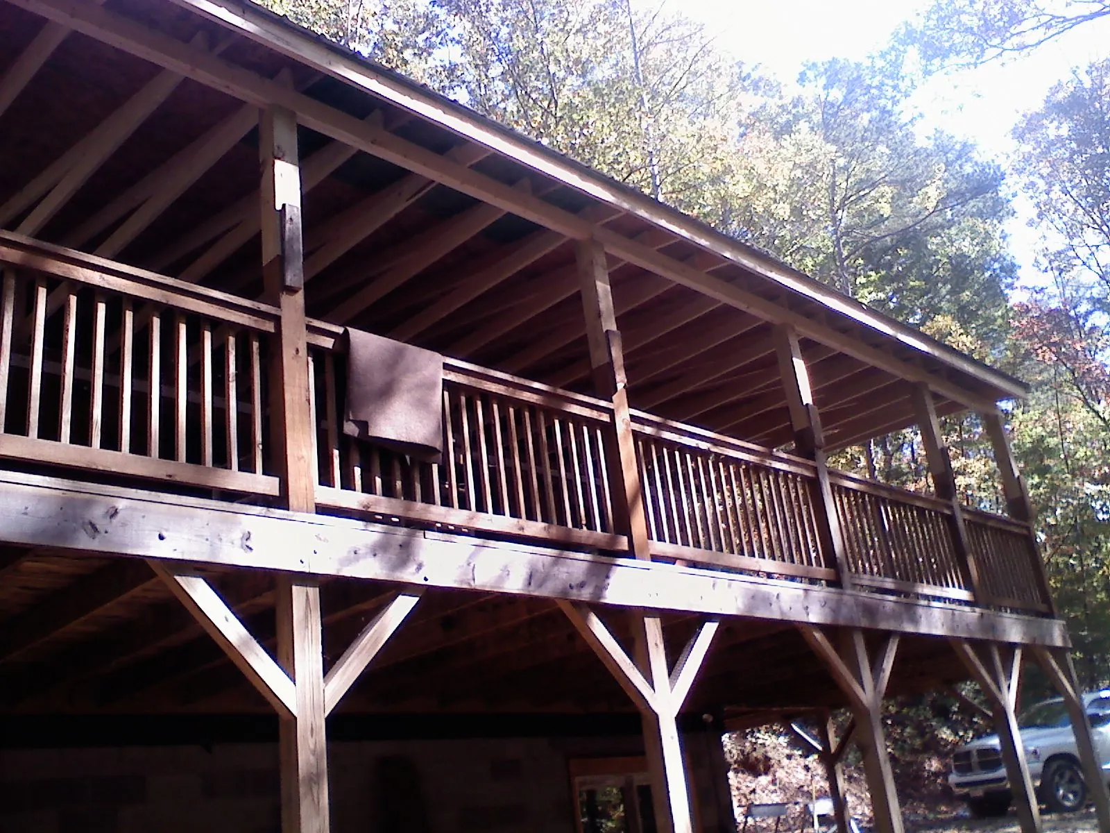 Timber framing under a new elevated porch and deck — Roof Leak Repair in Escalon by Roofing Brothers